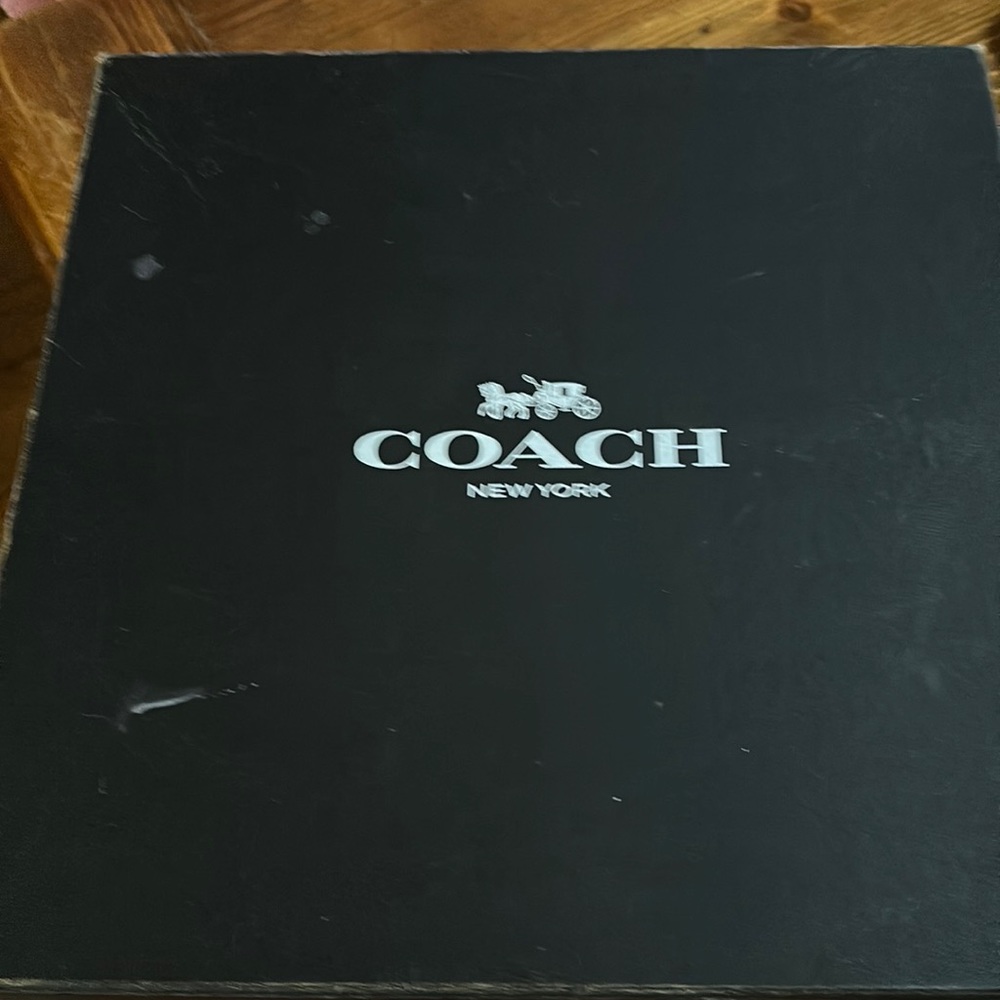 I am selling a dinosaur coach, leather WARE, sweatshirt, NWT